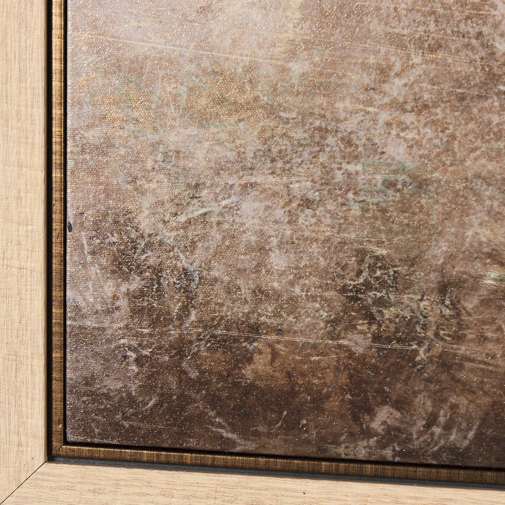 Close-up of textured brown canvas corner inside the light wood frame.