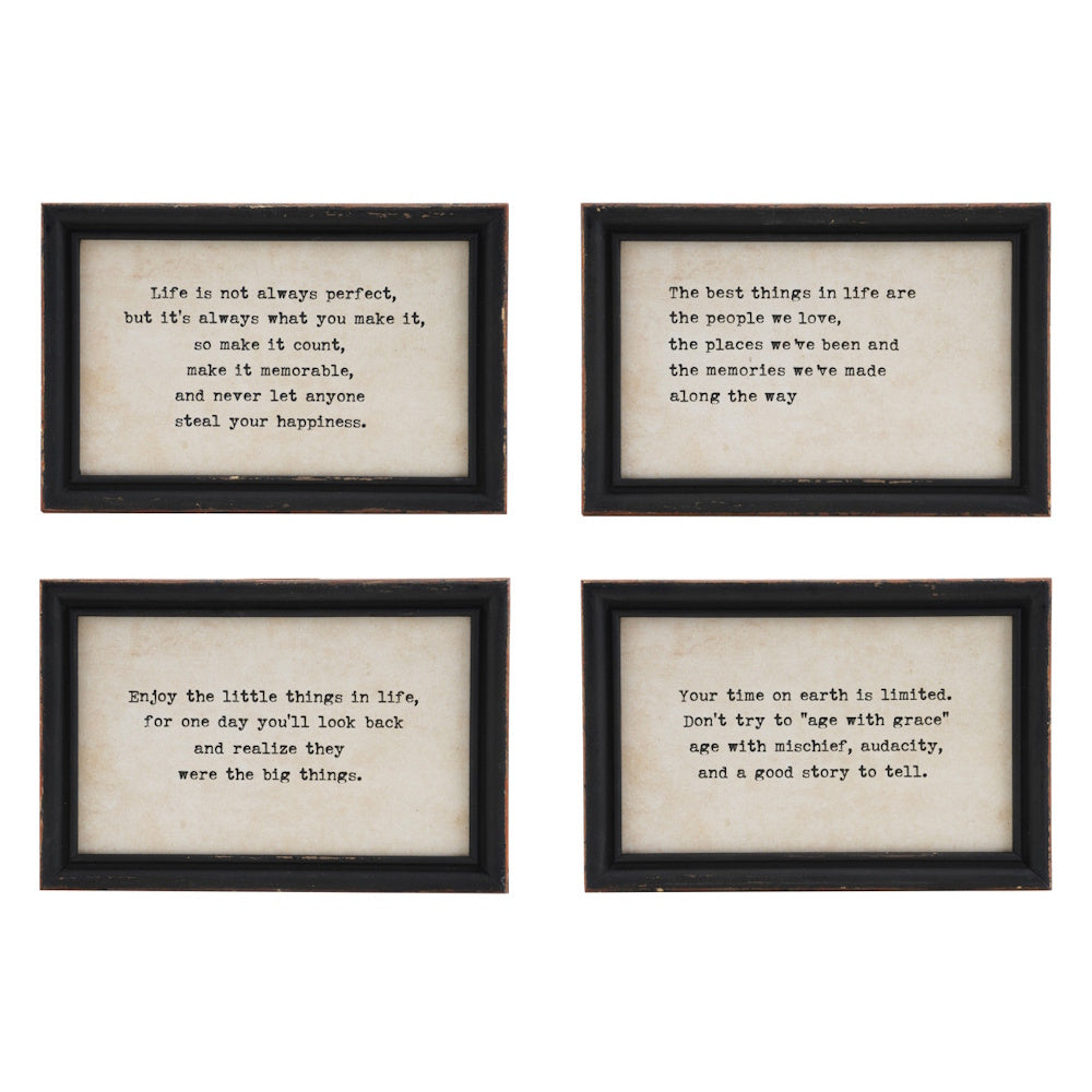 Four rectangular wall decor prints with inspirational quotes in black wood frames.