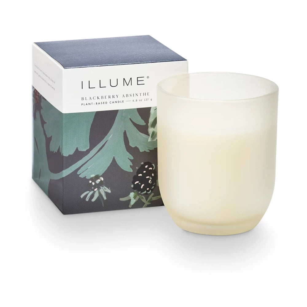 Illume Blackberry Absinthe plant-based candle in a frosted glass jar with its botanical-themed display box.
