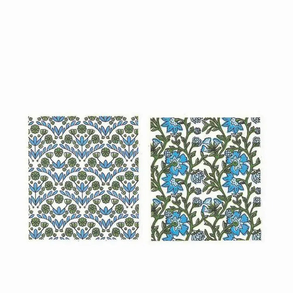 Pair of Indian block print fabric swatches featuring intricate geometric blue floral patterns and flowing botanical designs.