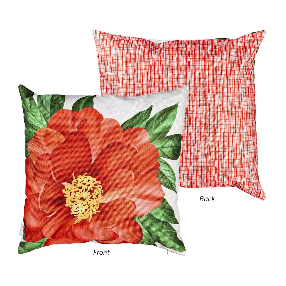 Front and back views of a throw pillow: one side features a red floral design, the other a textured pattern.