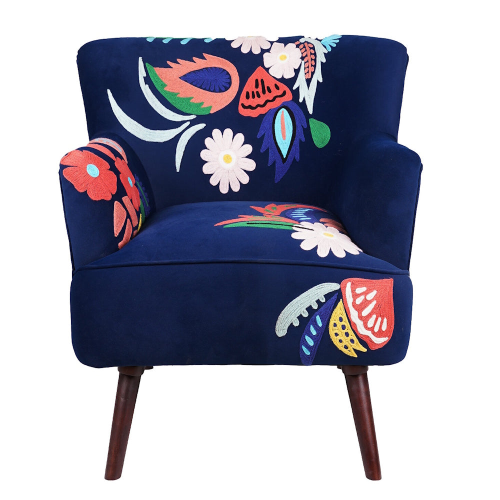 Front view of navy blue accent chair with colorful floral embroidery, plush upholstered seat and wooden legs.