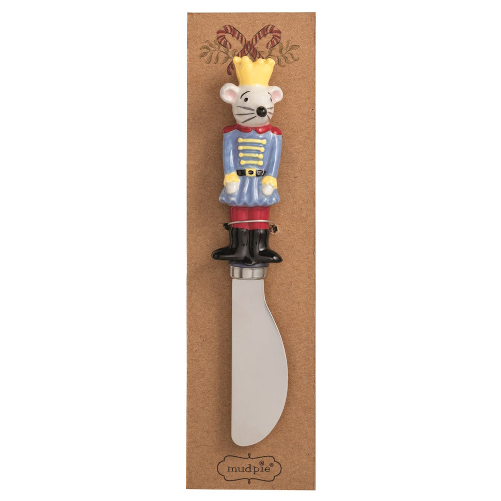 Blue nutcracker mouse spreader with a crown and a metal blade.