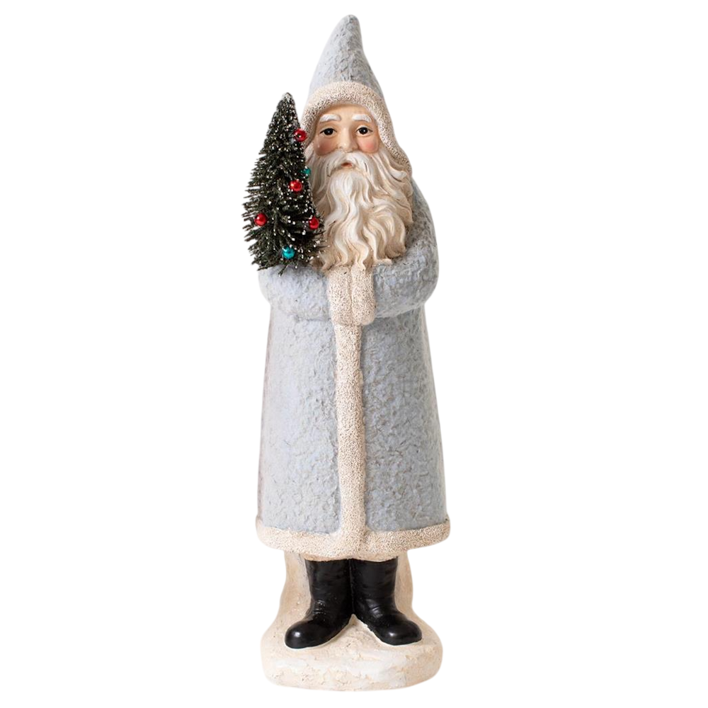 Light blue vintage Belsnickel Santa figurine holding a miniature decorated Christmas tree.