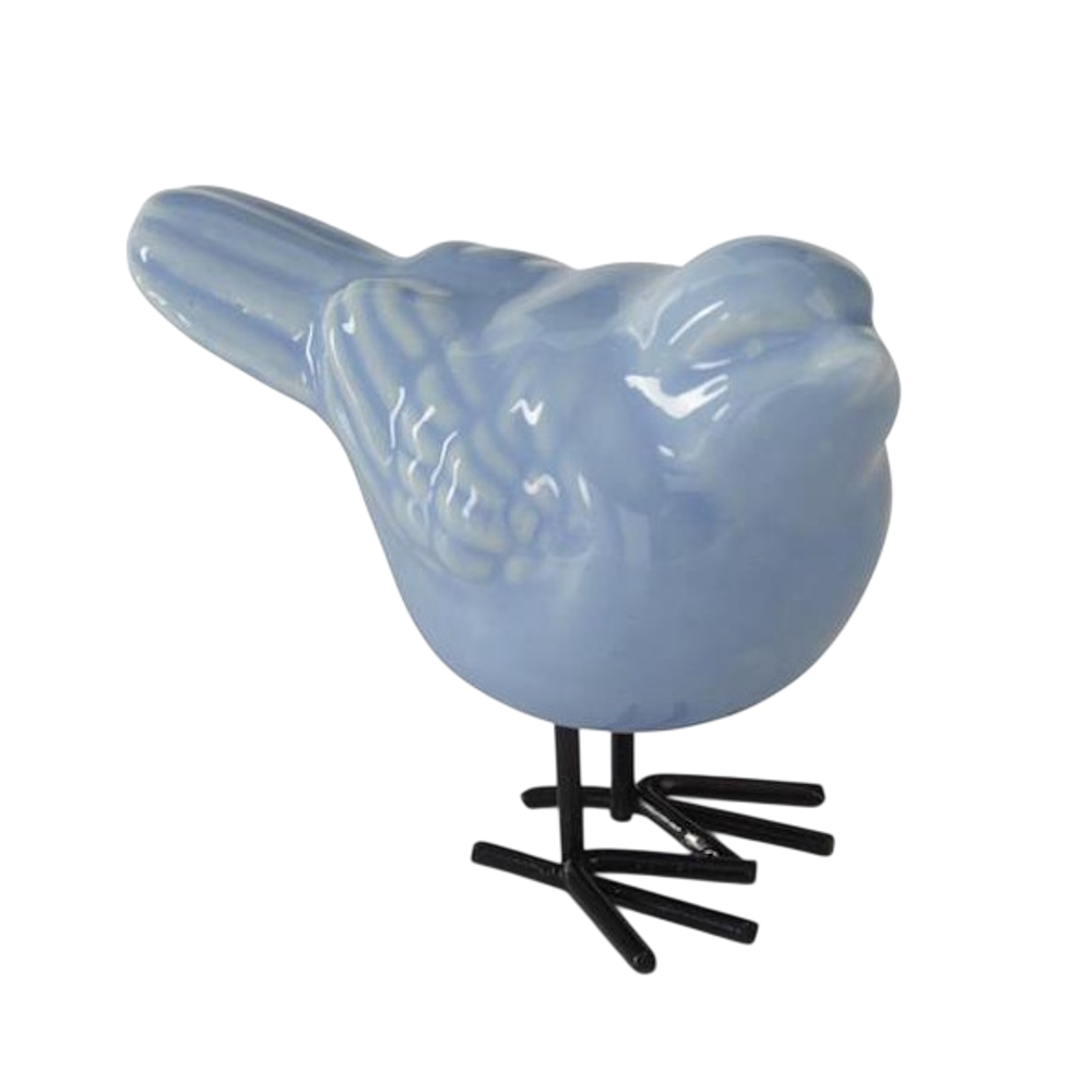 Light blue ceramic bird figurine with textured wings and black metal legs on a white background for home decor.