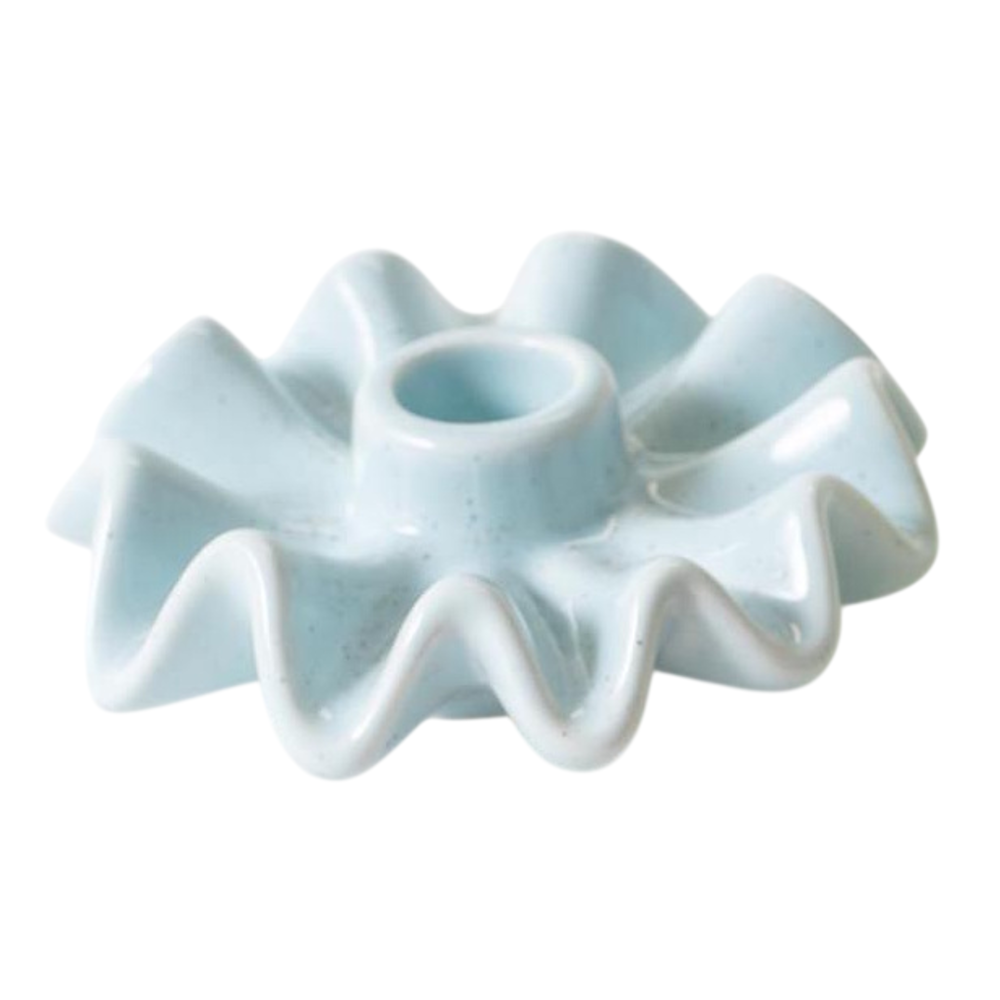 Light blue ceramic taper candle holder with a ruffled, wavy edge.