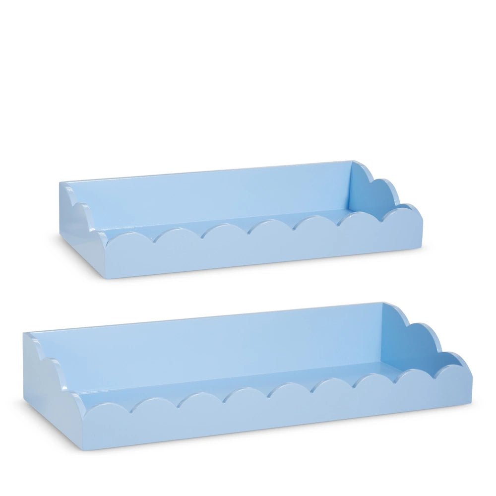 Two light blue wall shelves with scalloped edges and a tray-like design, shown in two different lengths against a white background.