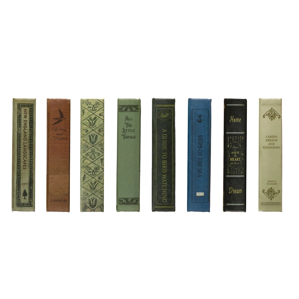 Collection of vintage book spines including New England Landscapes, Ships of the Sea, and A Guide to Bird Watching.