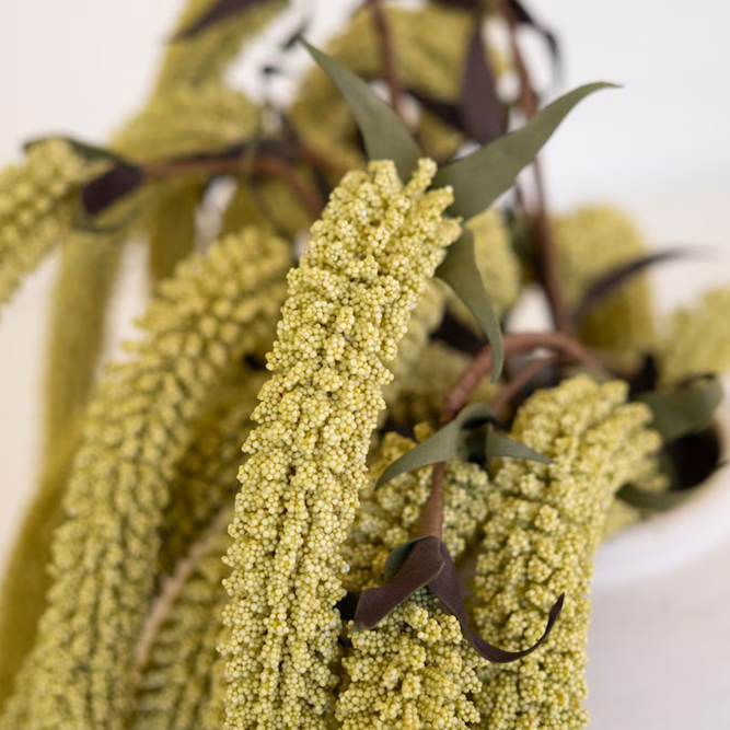 Artificial green millet spray branches with textured seed heads and dark leaves for floral arrangements.