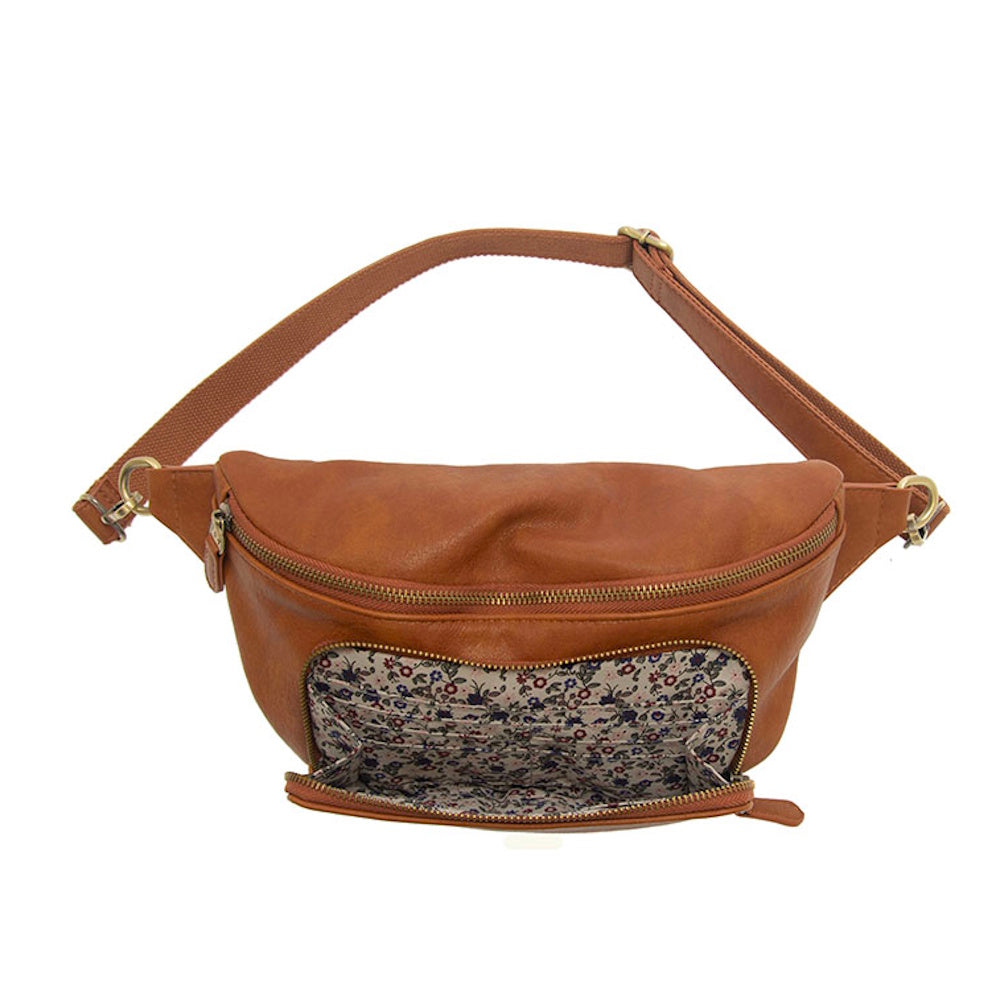 Brown faux leather belt bag with adjustable strap and open floral print front pocket organizer.