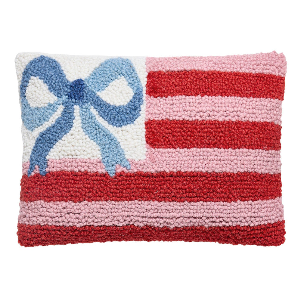 Hand-hooked decorative pillow with a light blue bow and pink and red American flag stripes.