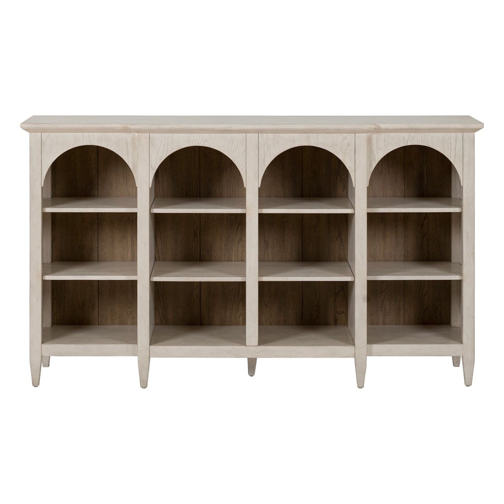 Front view of a light oak breakfront accent cabinet with four arched open display shelves.