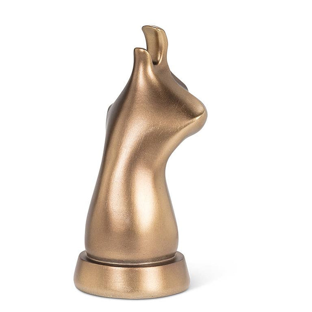 Bronze cat face eyeglass holder from the side view.