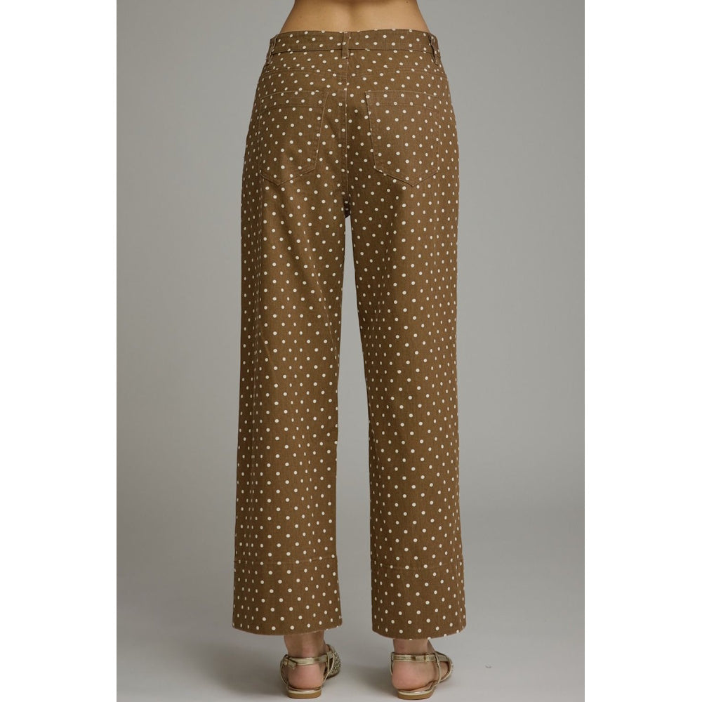 Back view of brown polka-dot wide-leg pants featuring two rear patch pockets.