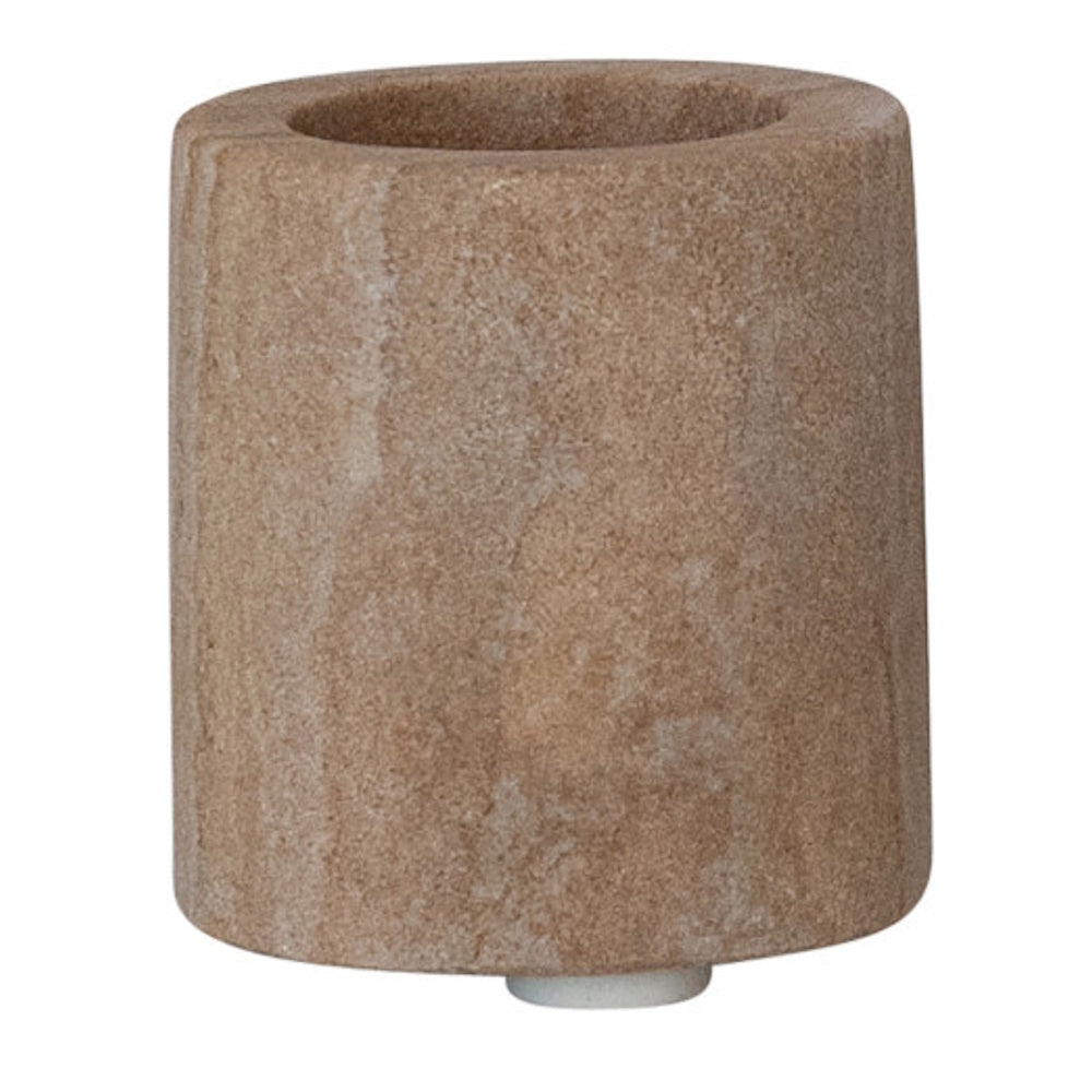 Cylindrical brown sandstone holder with a natural, textured stone finish on a white background.
