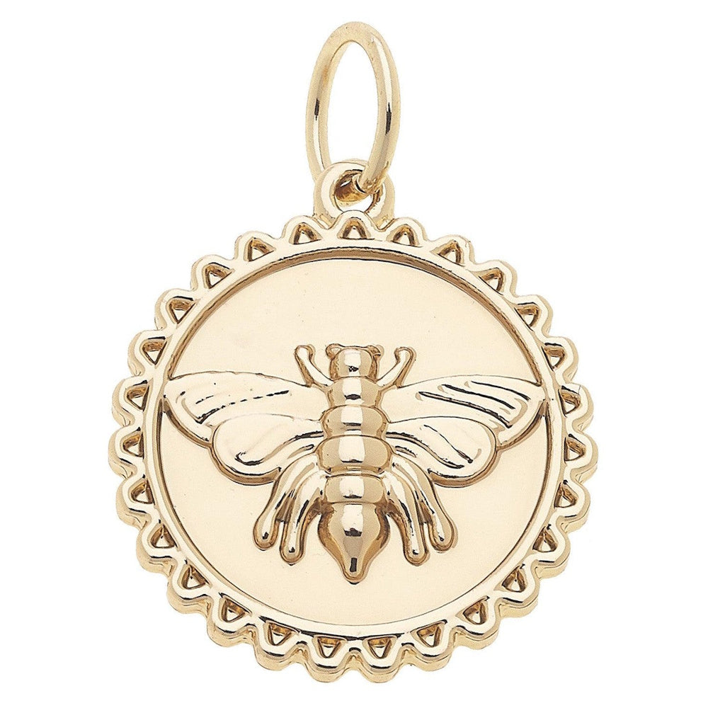 Shiny gold round medallion pendant featuring a bumble bee with a decorative scalloped edge.