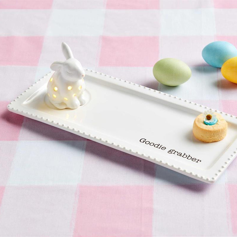 Ceramic Goodie Grabber Easter serving tray with light-up bunny sitter, decorative eggs, and a small cookie.