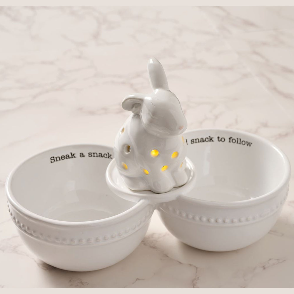White ceramic double snack bowl with a light-up bunny center and "Sneak a snack" text. Ideal for Easter or spring decor.