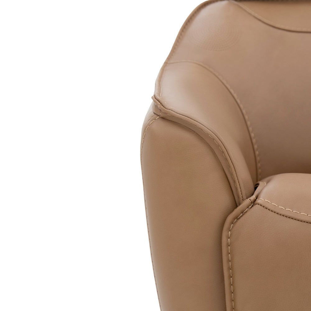 Close-up of a tan leather armchair's curved armrest with detailed stitching against a white background.