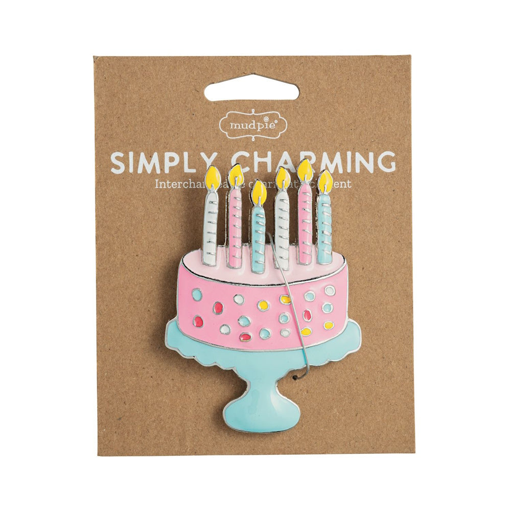 Mud Pie Simply Charming interchangeable pink birthday cake charm with candles on a blue stand.
