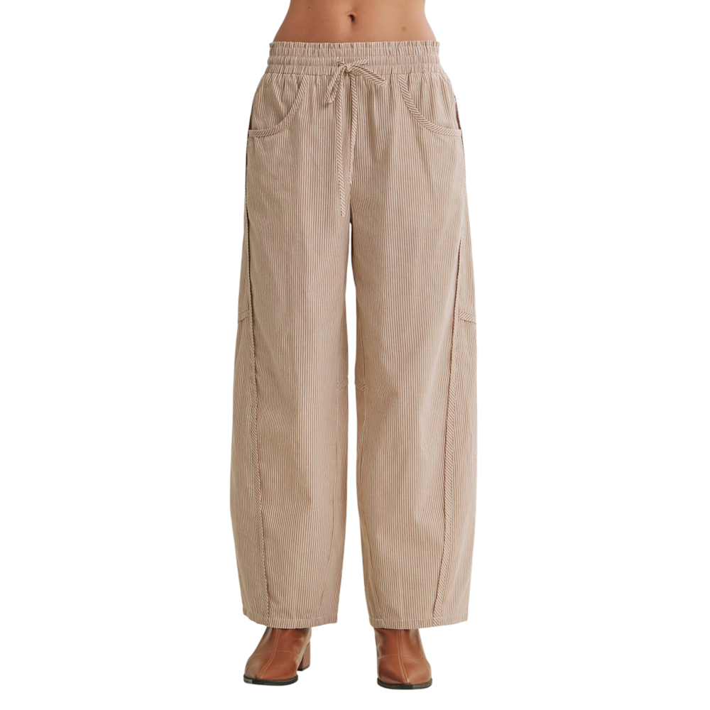 Front view of relaxed camel-and-white striped barrel pants with a drawstring waist and side pockets.