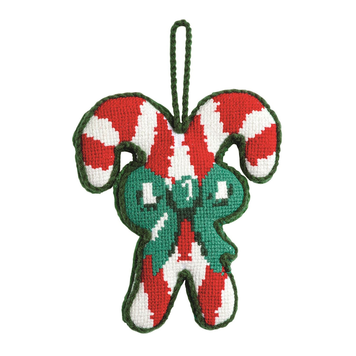 Handmade needlepoint ornament featuring crossed red-and-white candy canes tied with a green bow.
