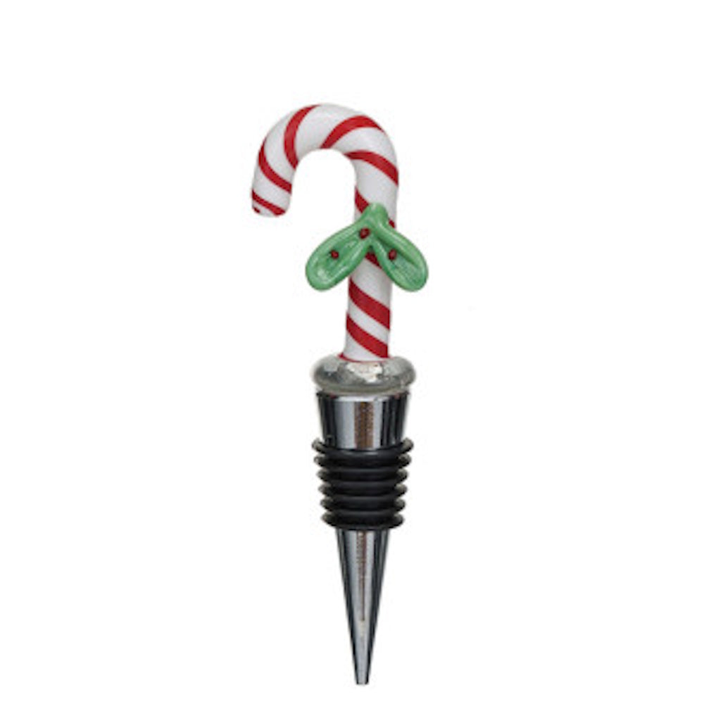 Christmas candy cane bottle stopper with green holly decor and a rubber-ribbed metal base.