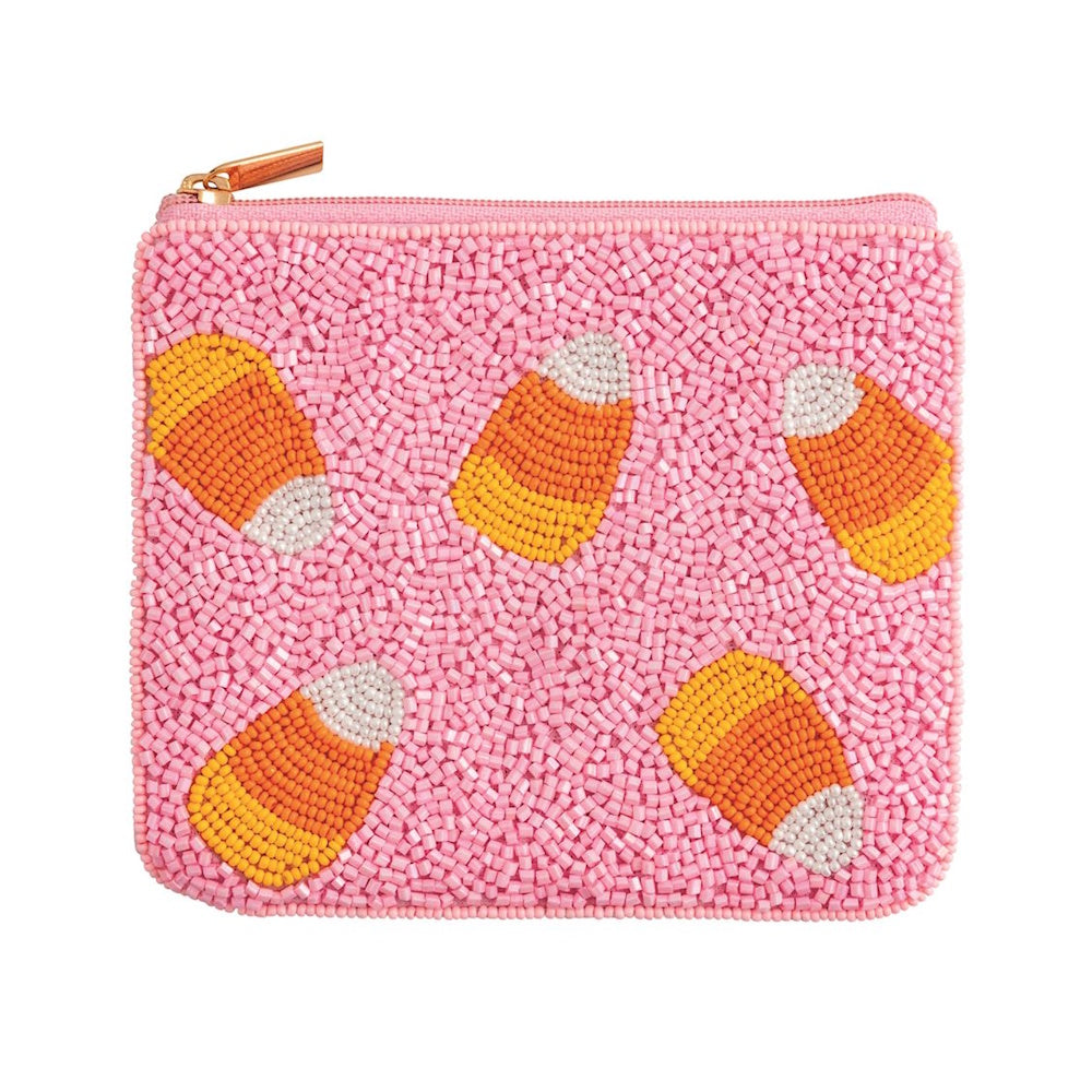 Beaded pink Halloween coin purse featuring five candy corn patterns and a gold zipper.