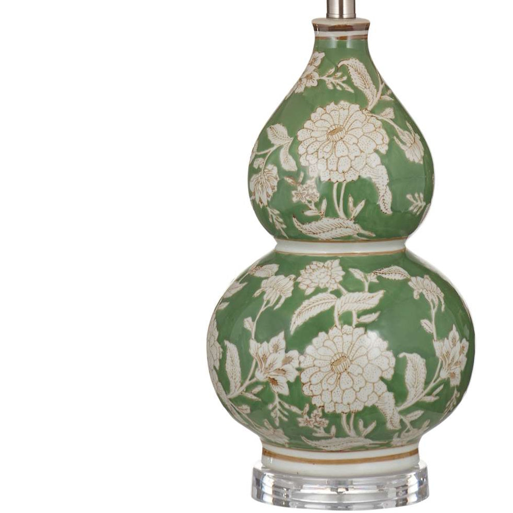 Green double gourd ceramic table lamp with white floral pattern and crystal base.
