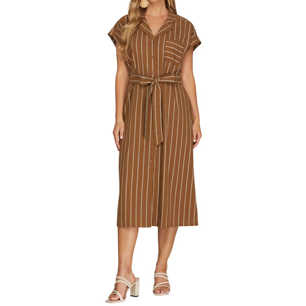 Woman in a striped caramel brown midi shirt dress with a waist tie, short sleeves, and strappy block heels.