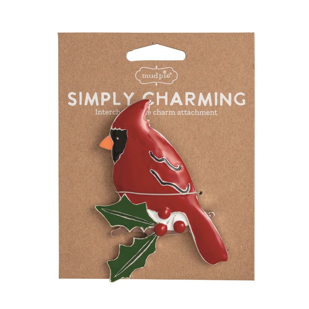 Mud Pie red cardinal bird interchangeable charm with holly leaves and berries on cardboard packaging.