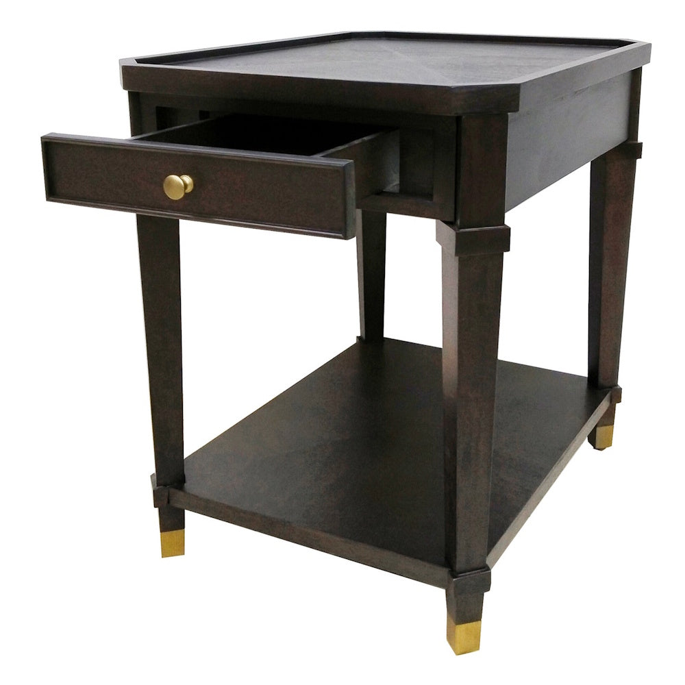 Dark wood end table with open drawer and gold feet for bedside furniture and storage.