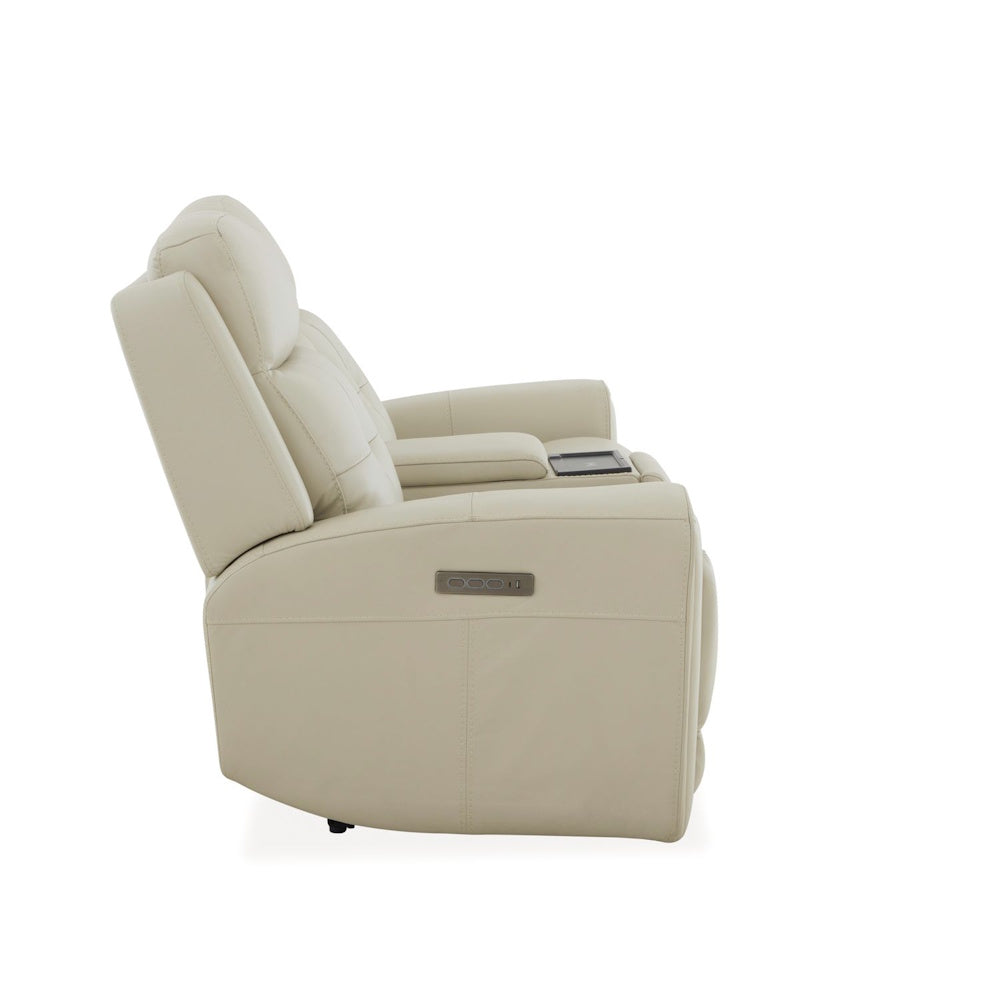 Side view of cream leather power reclining loveseat with center console, integrated controls and plush cushioning.