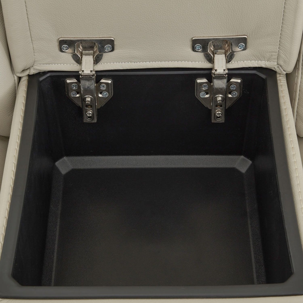 Hidden storage compartment inside power reclining sofa console with lift top lid and spacious interior storage bin.