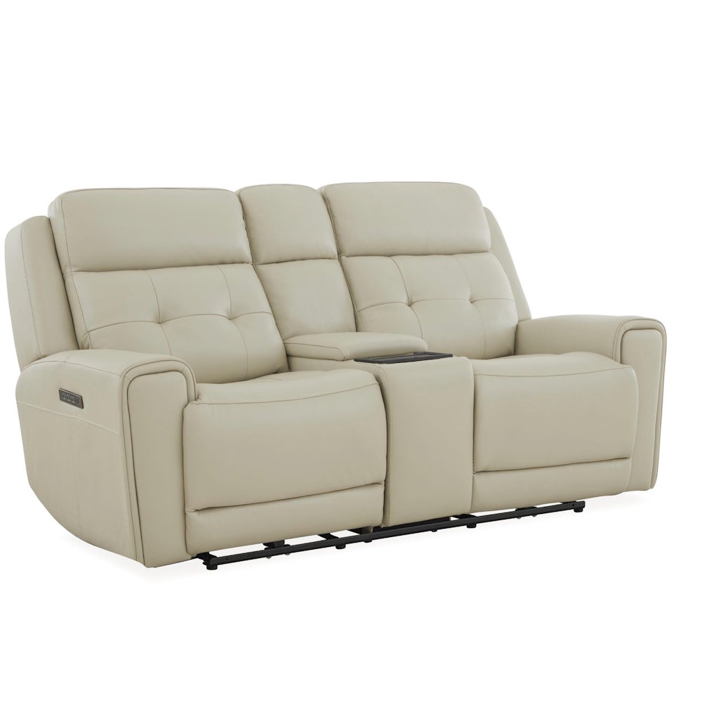 Cream leather power reclining loveseat with center console, tufted back cushions and padded track arms.