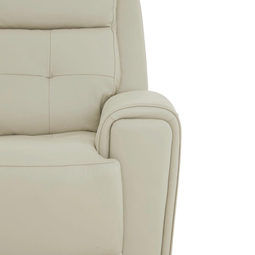 Cream leather sofa arm detail with padded rolled armrest, smooth upholstery and tailored stitching accents.