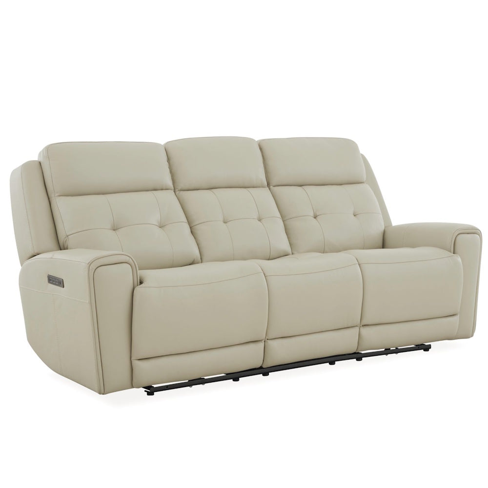 Cream leather power reclining sofa with tufted back cushions, padded arms and three seat design.