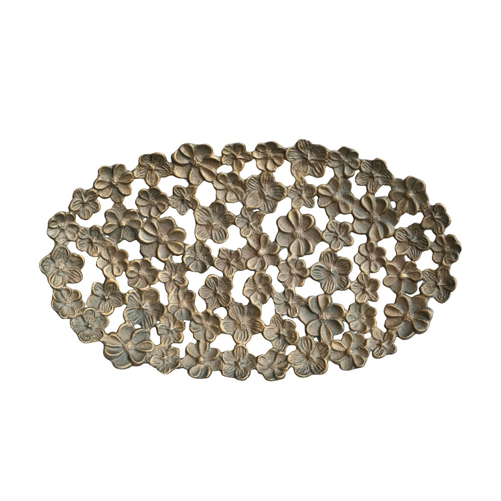 Oval cast aluminum flower tray with decorative cut-outs for elegant home decor.