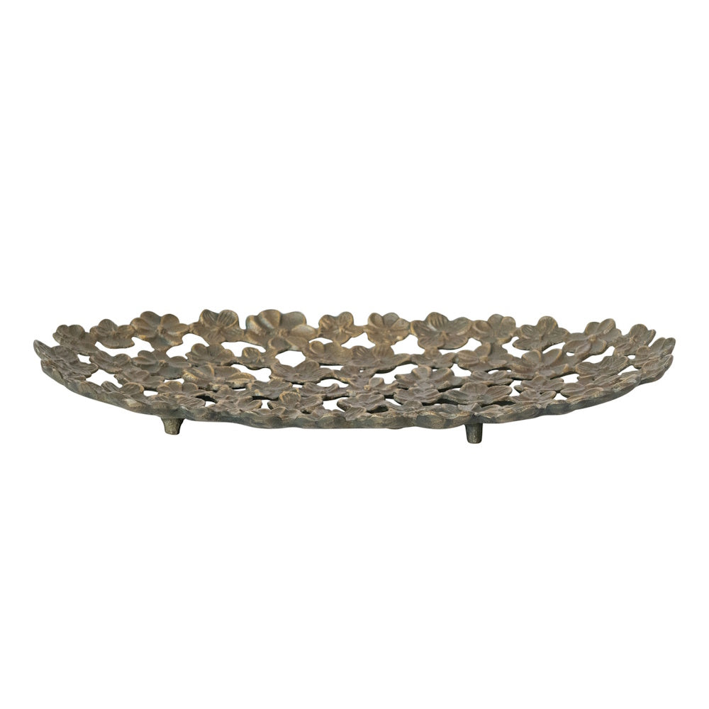 Cast aluminum flower tray with decorative floral cutouts and small feet.
