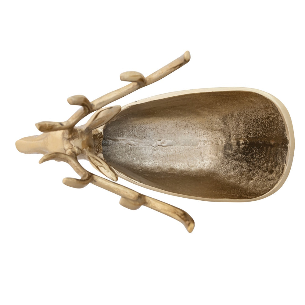 A top-down view of a gold cast aluminum reindeer-shaped bowl showing its hollow interior.