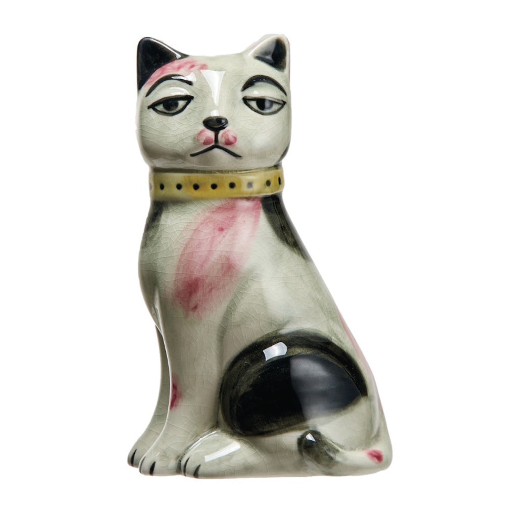 Sitting cat-shaped ceramic planter with a crackle glaze, black and pink patches, and a yellow collar.