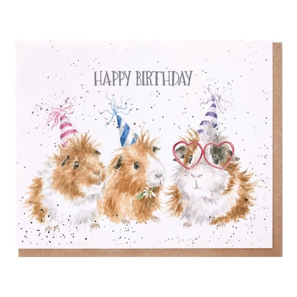 Watercolor Happy Birthday card featuring three fluffy guinea pigs wearing colorful party hats and heart-shaped glasses.