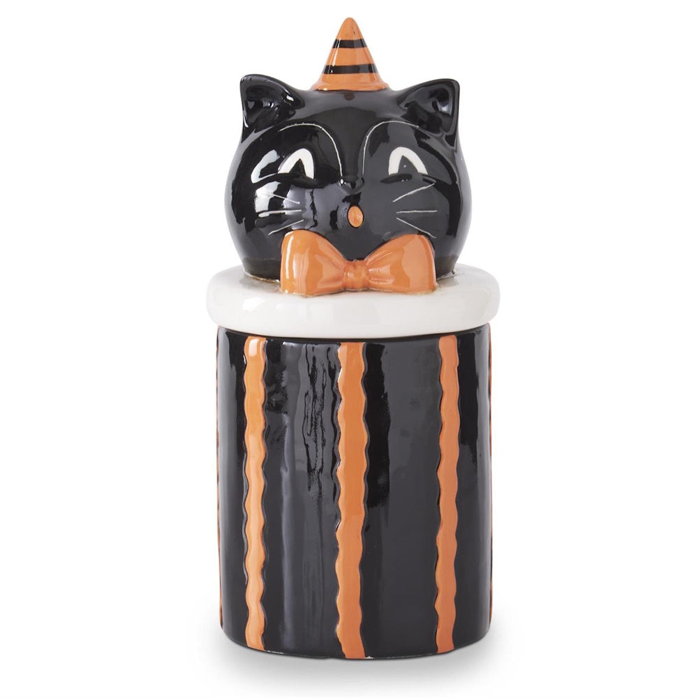 A glossy ceramic black cat canister with an orange bowtie, party hat, and orange vertical stripes.