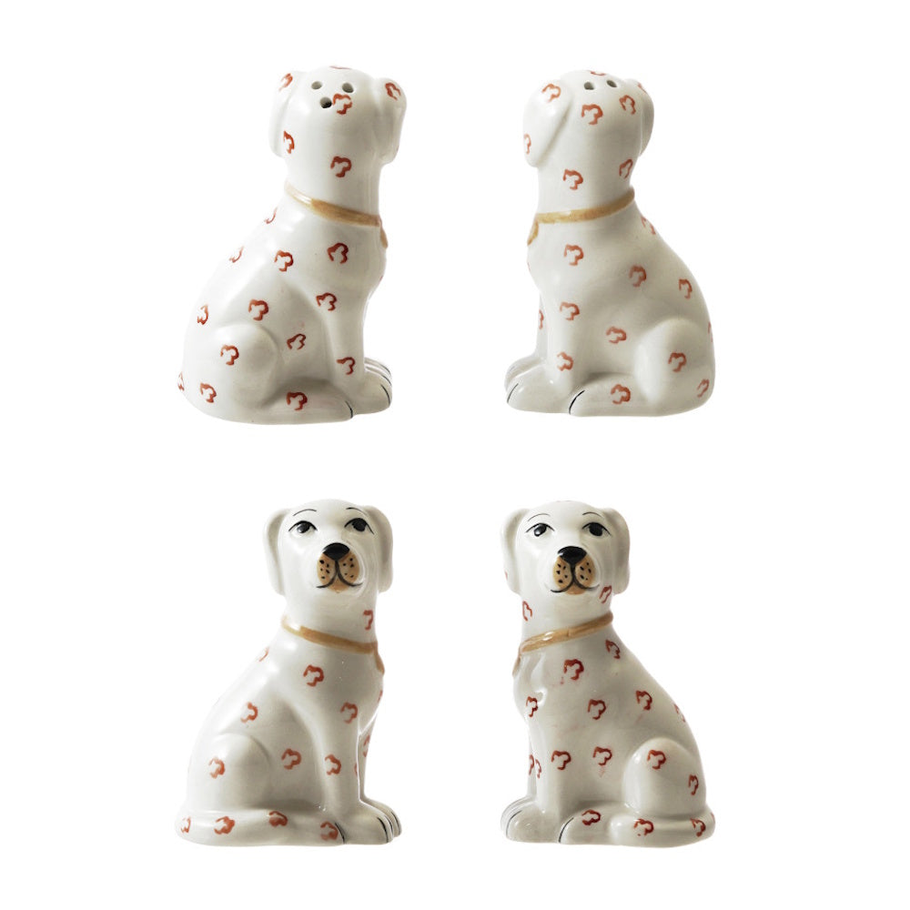 Ceramic dog-shaped salt and pepper shakers with red spots, shown from front and back angles.