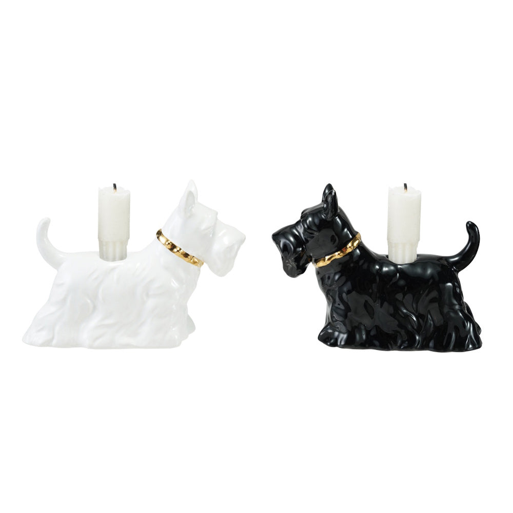Black and white ceramic Scottie dog taper candle holders with gold collars.