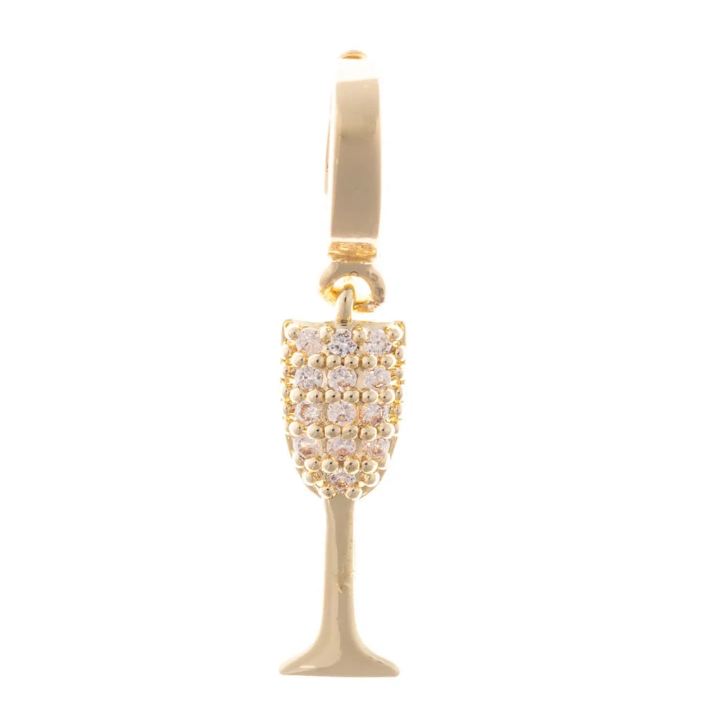 Gold champagne flute charm set with sparkling pave crystal accents along the bowl.