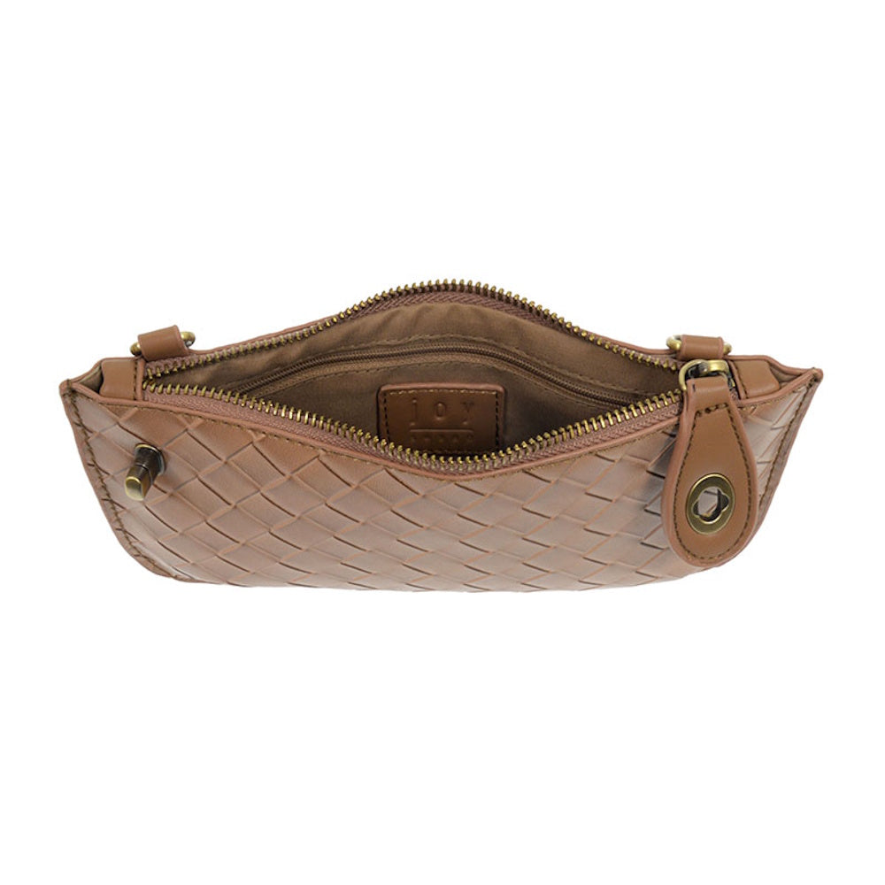 Open chestnut brown woven faux leather crossbody clutch with brass zipper and interior pocket on white background.