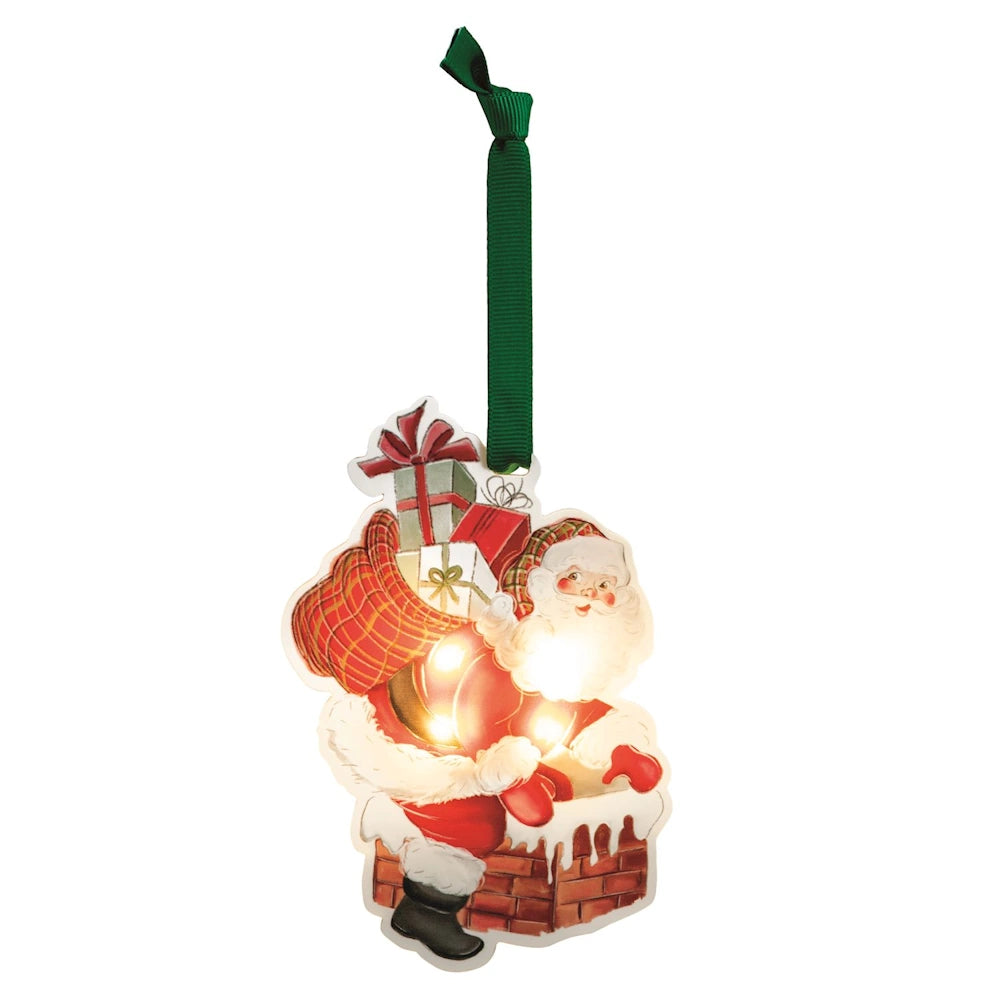Lighted Santa Christmas ornament with a toy sack going down a chimney, hung by a green ribbon.