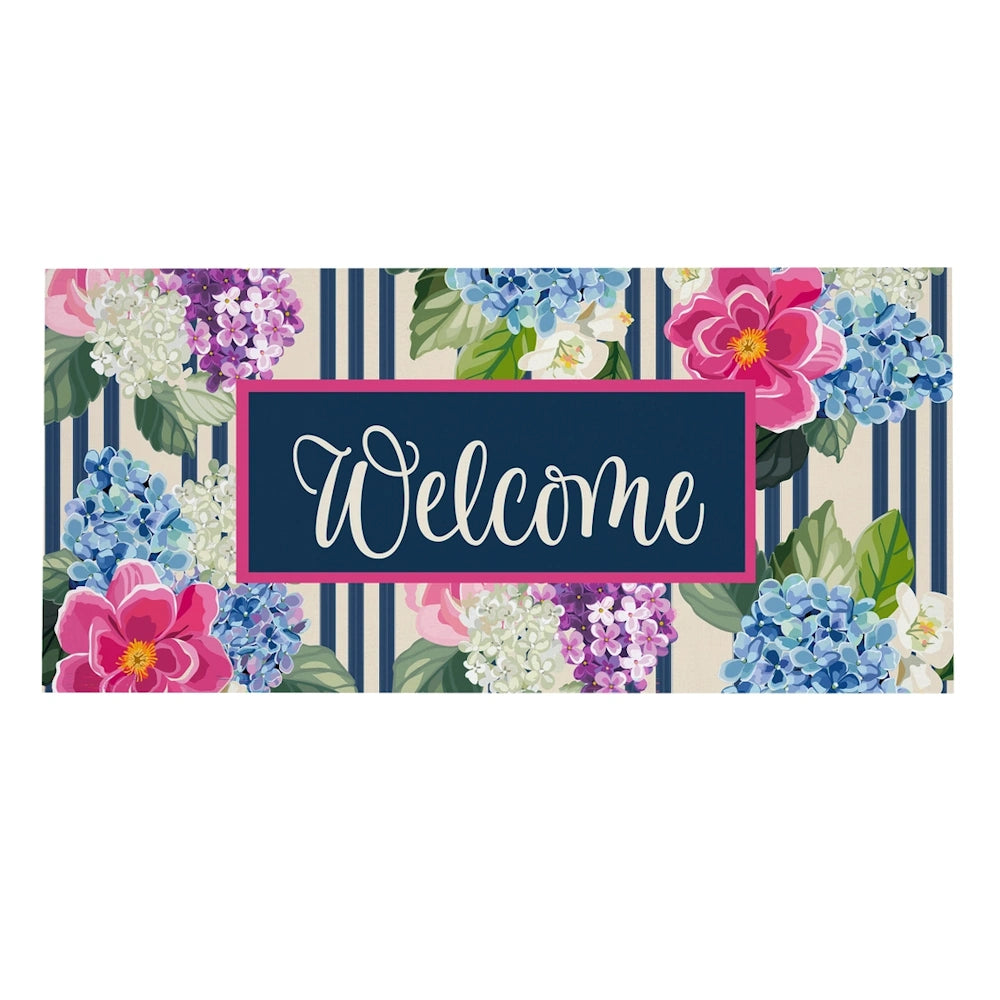 Chinoiserie floral Welcome mat with pink and blue hydrangeas on a navy striped background.