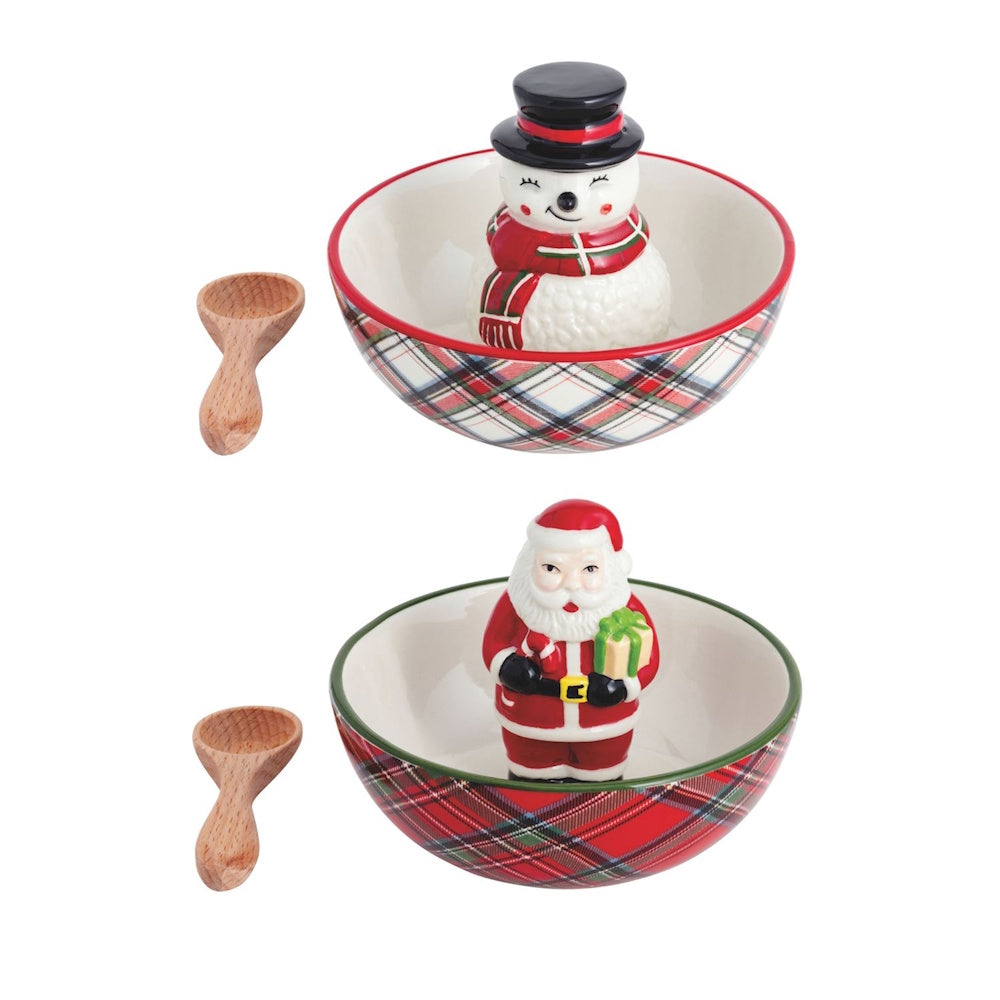 Tartan plaid holiday candy bowls with snowman and Santa figurines and wooden spoons.